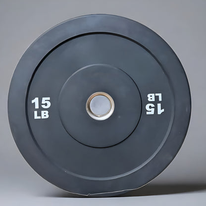 Paire de bumper plates de 15 lbs en caoutchouc résistant, parfaites pour les entraînements techniques.