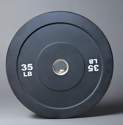 Paire de bumper plates de 35 lbs durables en caoutchouc, conçues pour l’entraînement de musculation et d’haltérophilie.