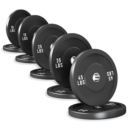 Ensemble complet de bumper plates en caoutchouc noir totalisant 260 lbs, disposé au sol avec toutes les tailles visibles.