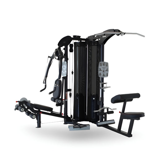 Multi-station de musculation Inspire M5 avec double colonne de poids, offrant deux postes d'entraînement simultanés.
