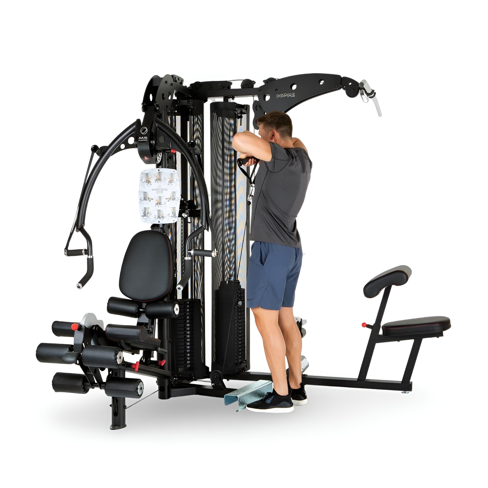 Aménagement d'un gym à domicile de luxe avec la multi-station Inspire M5 dans un espace moderne.