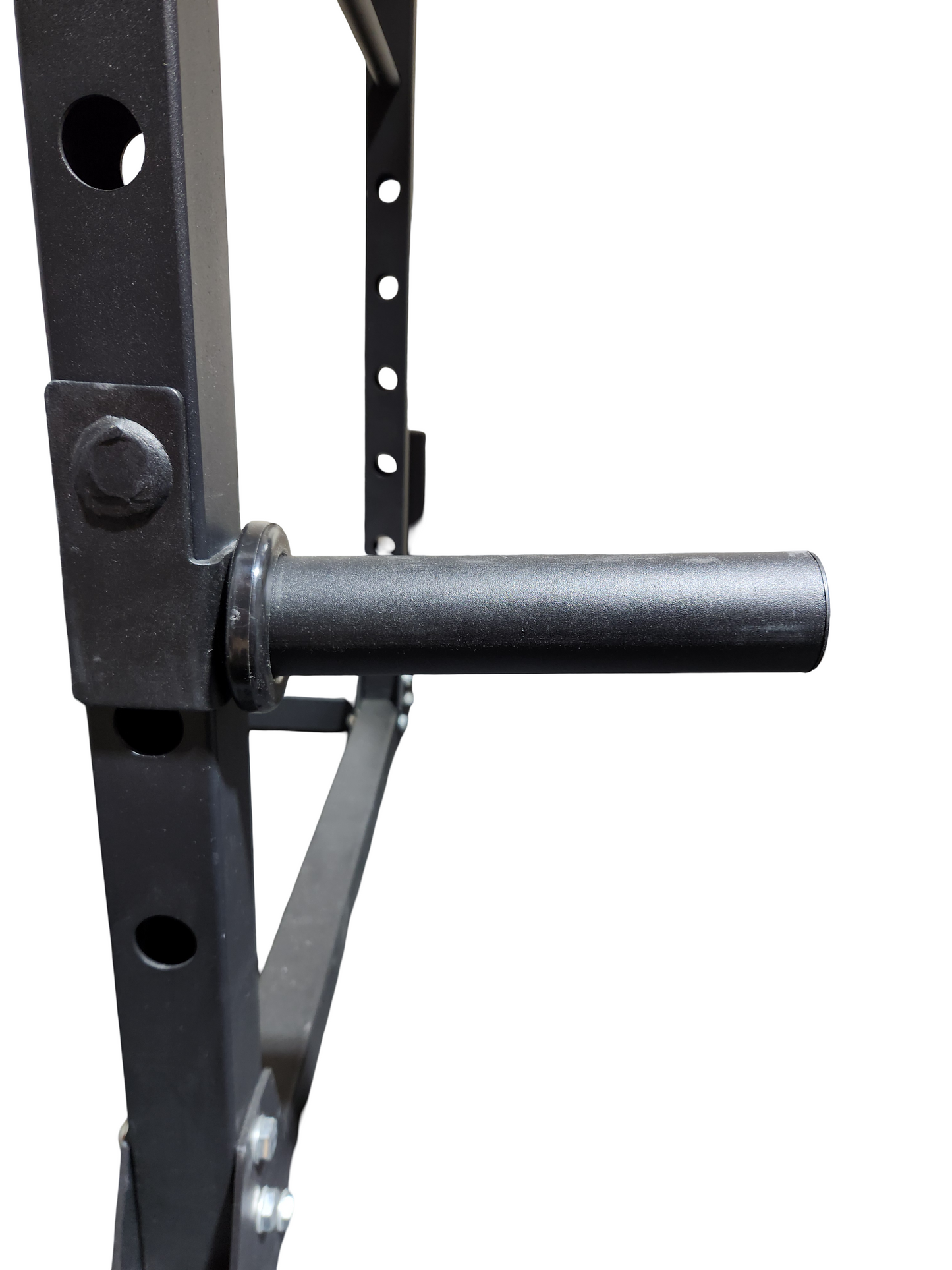 Image d'un support à plaques olympiques 2po, installé sur une cage 2x2 démontrant son inclinaison et sa fonctionnalité.