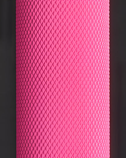 Plan rapproché de la texture anti-dérapante de la barre rose pour un confort et une bonne prise en main.