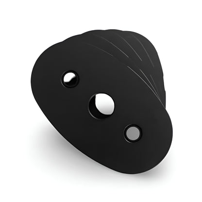 Vue rapprochée en perspective d'une plaque de l'ensemble d'ajout de poids Inspire Fitness de 50 lb, montrant les orifices de fixation sur un fond blanc.