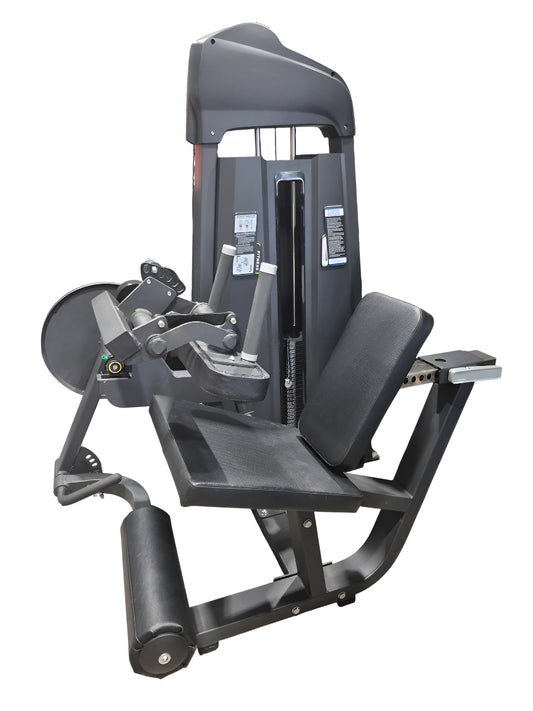Vue de trois quarts de la machine combo Leg Extension / Leg Curl commerciale, montrant son siège incliné, ses rouleaux rembourrés et sa colonne de poids intégrée.