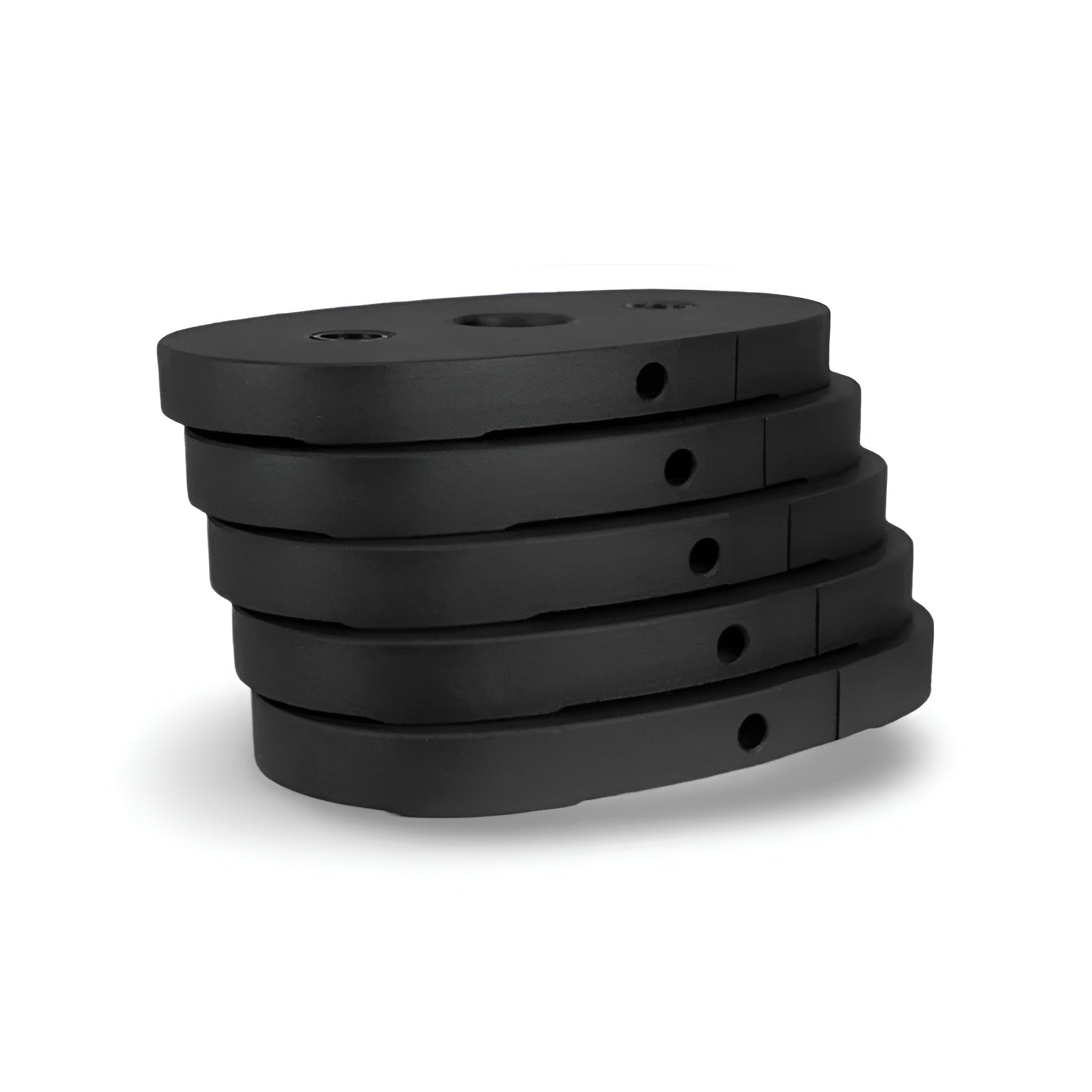 Pile des cinq plaques de poids de 10 lb de l'ensemble d'ajout de poids Inspire Fitness, conçues pour accroître la résistance des équipements compatibles.